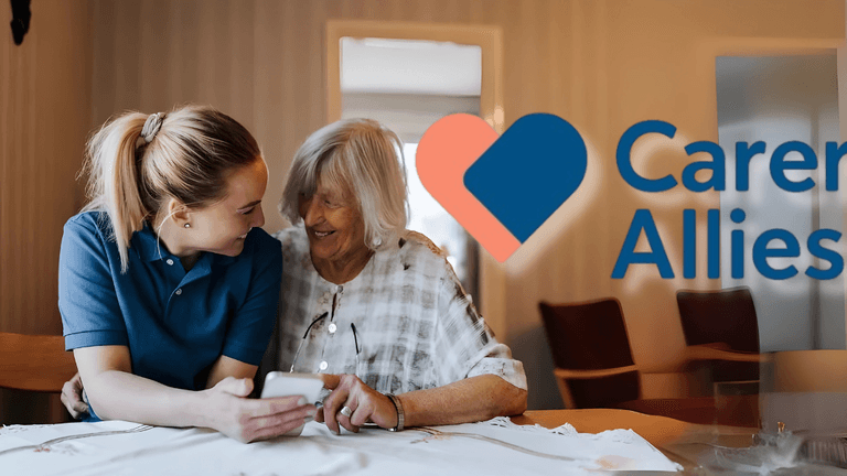 Caregiver and elderly person smiling together, with the Carer Allies logo in the background, symbolizing support for carers.