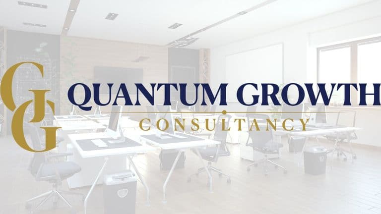 Quantum Growth Consultancy logo over modern office workspace background.