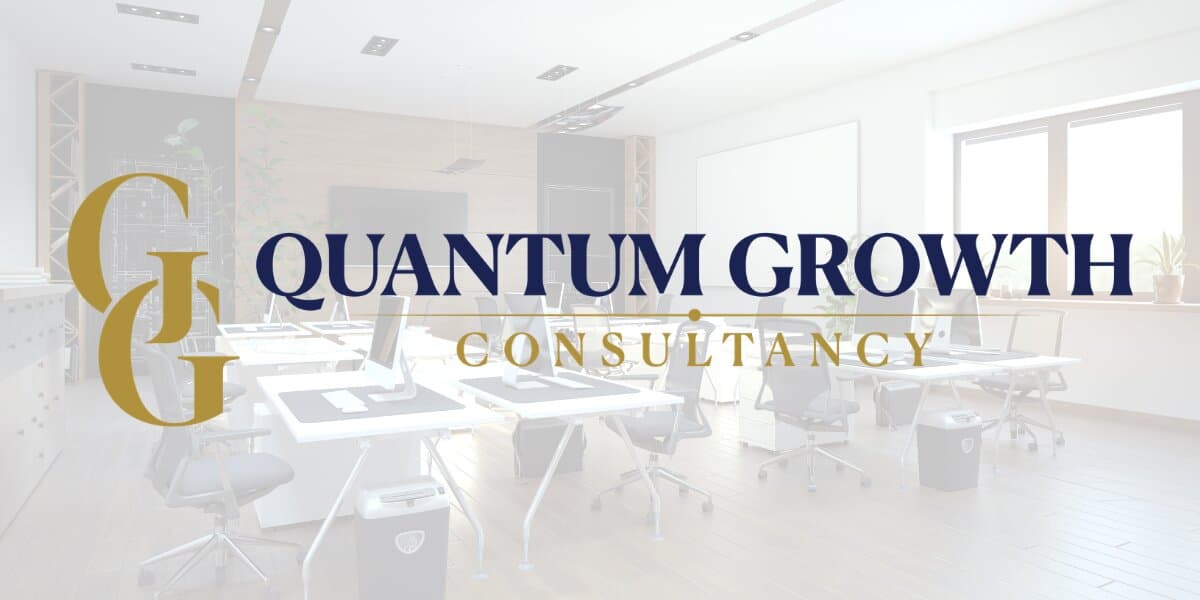 Quantum Growth Consultancy logo over modern office workspace background.