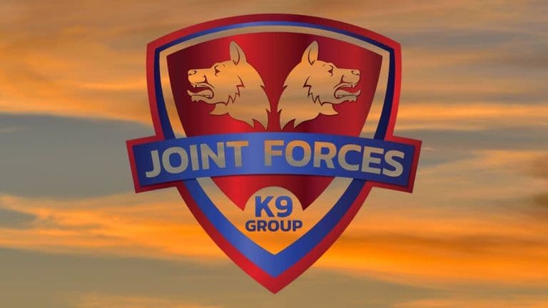 oint Forces K9 Group logo, featuring two wolves and a shield with the brand's name.