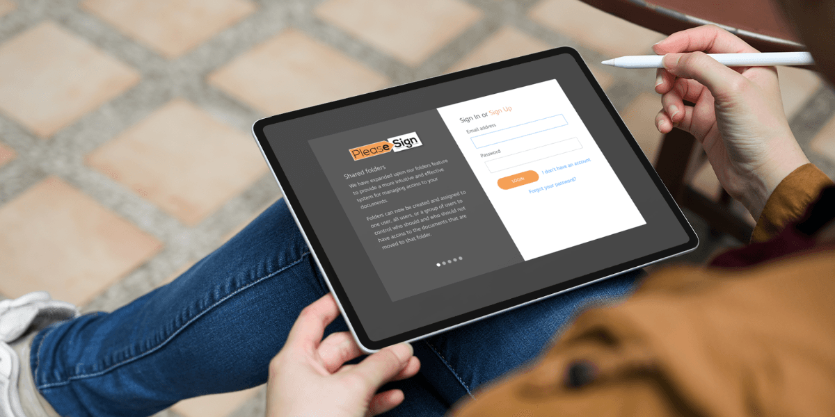 Person using tablet to access PleaseSign digital signing platform with stylus in hand.