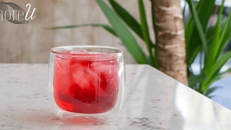 A refreshing glass of moreU's wellness drink, showcasing their flagship product, morecalm, designed to offer gentle, balanced support for individuals with unique health needs. The image reflects moreU's commitment to empathy, personalized wellness, and providing safe, effective solutions.