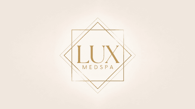 Lux MedSpa logo featuring gold text and geometric design on a light background