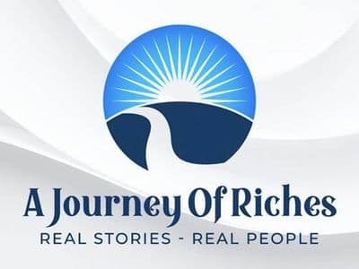 Logo featuring a sunrise over hills and the text "A Journey Of Riches"