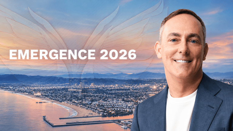 Smiling man in a suit with coastal city skyline and "EMERGENCE 2026" text