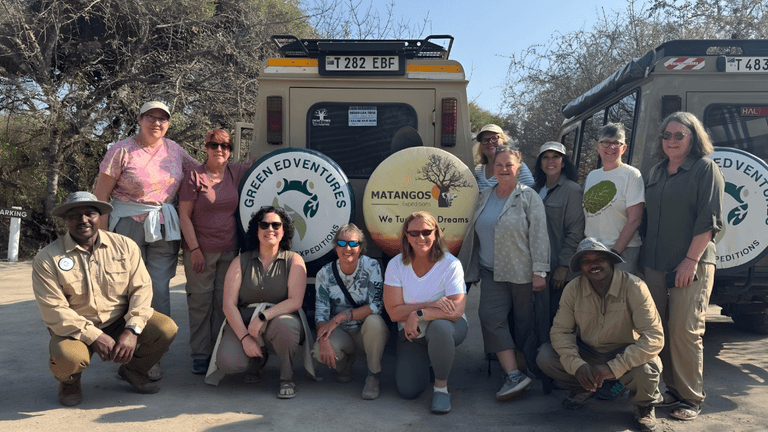 Group photo with Green Edventures guides and travelers at the start of their safari adventure.