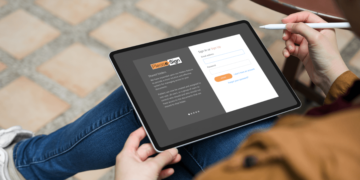 Person using tablet to access PleaseSign digital signing platform with stylus in hand.