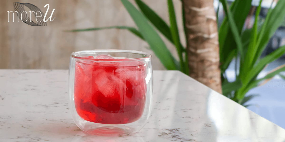 A refreshing glass of moreU's wellness drink, showcasing their flagship product, morecalm, designed to offer gentle, balanced support for individuals with unique health needs. The image reflects moreU's commitment to empathy, personalized wellness, and providing safe, effective solutions.