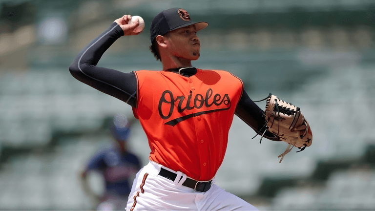 Harol Arias, Baltimore Orioles pitcher, showcasing his versatility and leadership as he progresses toward his MLB breakthrough.