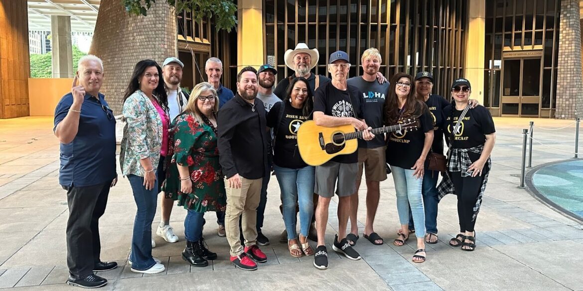 A group of individuals standing together, showcasing unity, diversity, and spiritual leadership, aligning with Army of the Lord's mission.