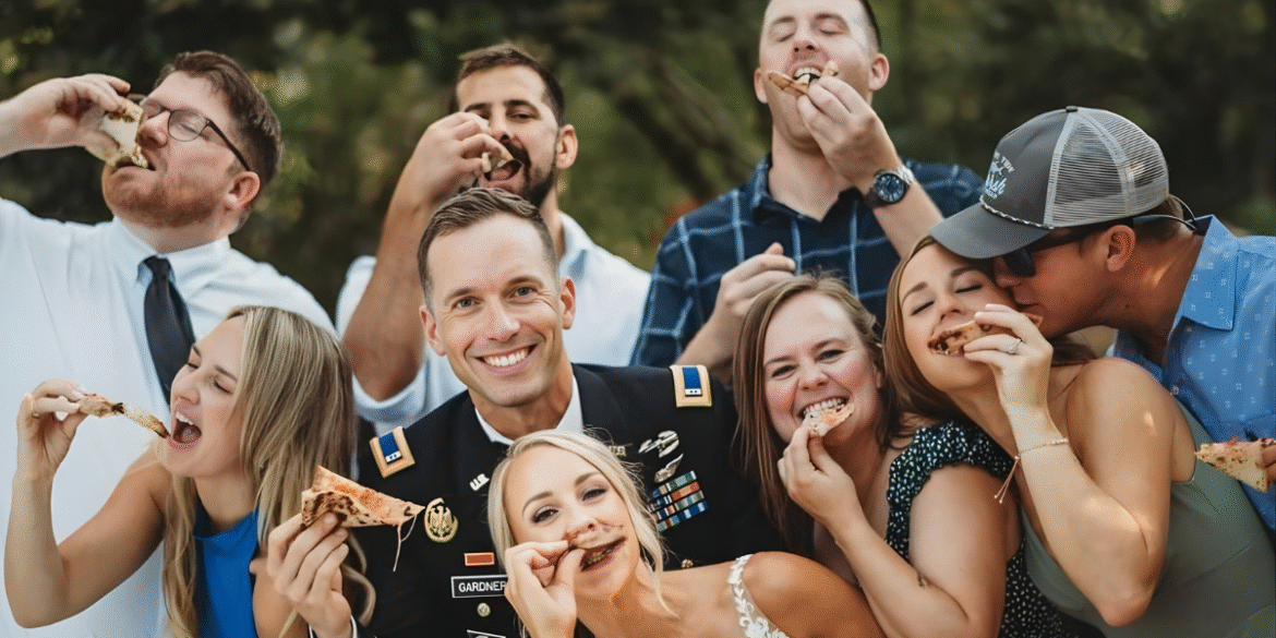 a joyful group enjoying pizza at an event, reflecting Atlanta Pizza Truck’s focus on creating memorable, interactive experiences