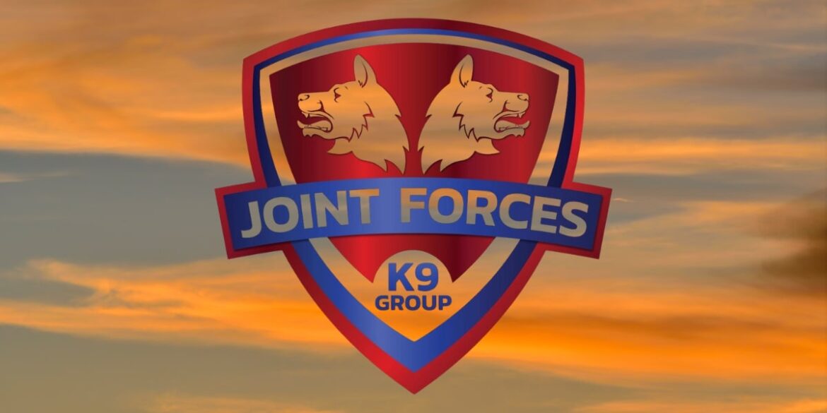 oint Forces K9 Group logo, featuring two wolves and a shield with the brand's name.