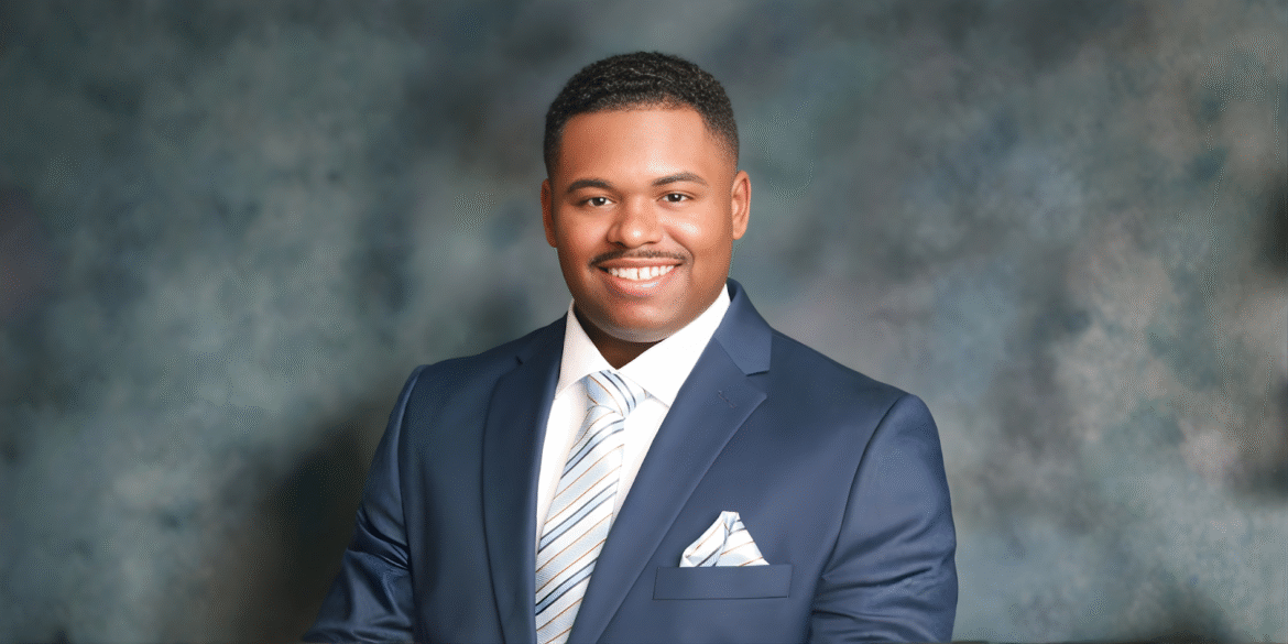 Daniel McDavid, founder of Move Mountains Credit Repair, pictured professionally in a suit, embodying dedication to financial empowerment and credit repair services.