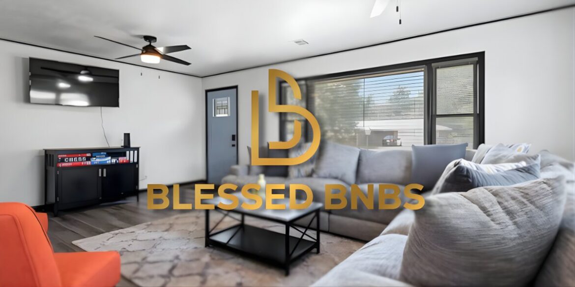 Living room with luxury furniture, a TV, and a modern design, featuring the Blessed BNBS logo in the foreground