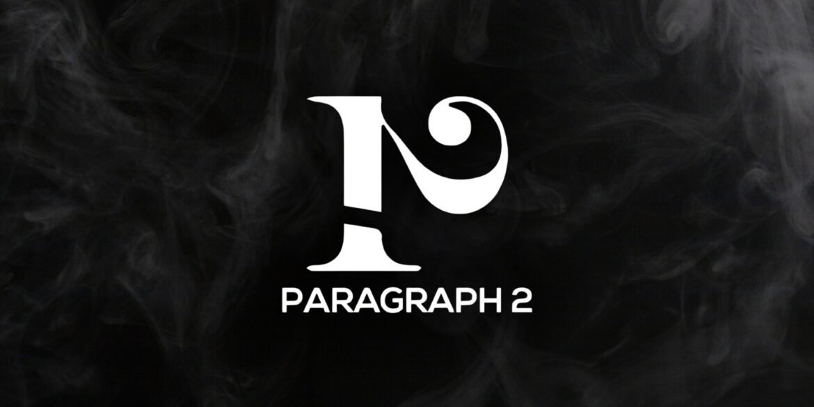 White Paragraph 2 logo centered on a dark smoky background.